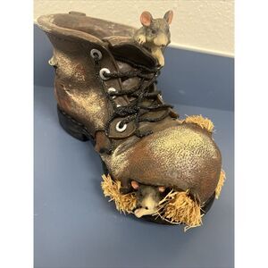 Old Ragged Shoe, Torn Boots with mice and a few straw